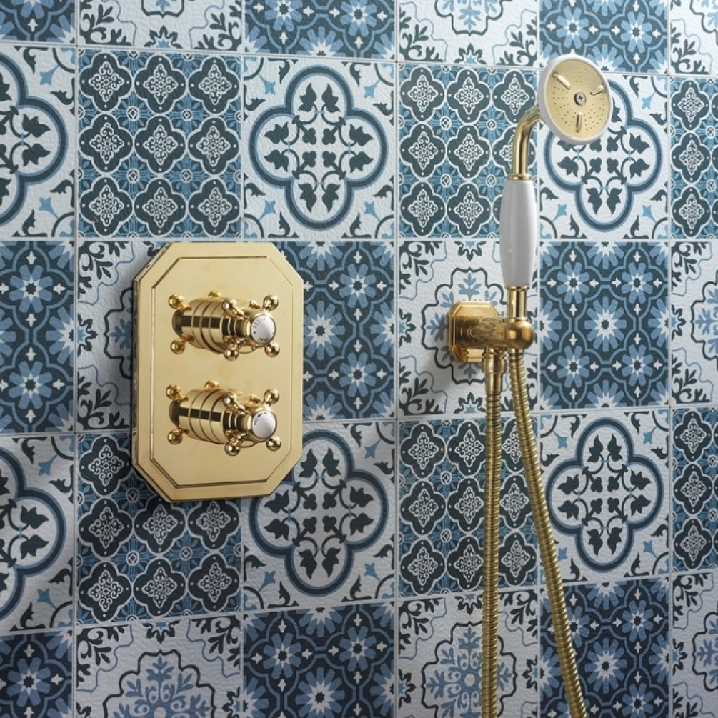 Product Lifestyle image of the Crosswater Belgravia Unlacquered Brass Handset Package paired with Belgravia Unlacquered Brass 1 Outlet 2 Handle Thermostatic Shower Valve